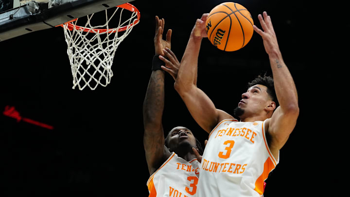 Nov 24, 2025; Las Vegas, NV, USA; Tennessee Volunteers guard Bishop Boswell (3) grabs the rebound against the Rutgers Scarlet Knights during the second half in a 2025 Players Era Festival group play game at MGM Grand Garden Arena. Mandatory Credit: Stephen R. Sylvanie-Imagn Images