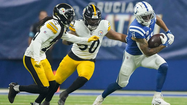 Pittsburgh Steelers linebacker Elandon Roberts (50) and Pittsburgh Steelers cornerback Donte Jackson (26) chase after Indianapolis Colts wide receiver Michael Pittman Jr. (11) on Sunday, Sept. 29, 2024, during a game against the Pittsburgh Steelers at Lucas Oil Stadium in Indianapolis. Pittsburgh Steelers linebacker Elandon Roberts (50) and Pittsburgh Steelers cornerback Donte Jackson (26) chase after Indianapolis Colts wide receiver Michael Pittman Jr. (11) on Sunday, Sept. 29, 2024, during a game against the Pittsburgh Steelers at Lucas Oil Stadium in Indianapolis.