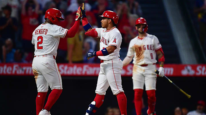 Aug 1, 2025; Anaheim, California, USA; Los Angeles Angels right fielder Gustavo Campero (51) is greeted by second baseman Luis Rengifo (2) after hitting a two run home run against the Chicago White Sox during the fifth inning at Angel Stadium. Mandatory Credit: Gary A. Vasquez-Imagn Images