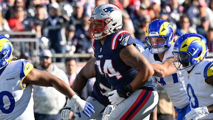 Nov 17, 2024; Foxborough, Massachusetts, USA; New England Patriots guard Michael Jordan (74) in game action against the Los Angeles Rams during the first half at Gillette Stadium. Mandatory Credit: Eric Canha-Imagn Images