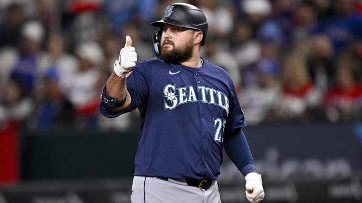 May 2, 2025; Arlington, Texas, USA; Seattle Mariners first baseman Rowdy Tellez (23) motions to the dugout after he hits a single against the Texas Rangers during the second inning at Globe Life Field. Mandatory Credit: Jerome Miron-Imagn Images