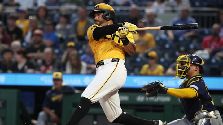 Sep 5, 2025; Pittsburgh, Pennsylvania, USA;  Pittsburgh Pirates left fielder Tommy Pham (28) hits a RBI double against the Milwaukee Brewers during the third inning at PNC Park. Mandatory Credit: Charles LeClaire-Imagn Images