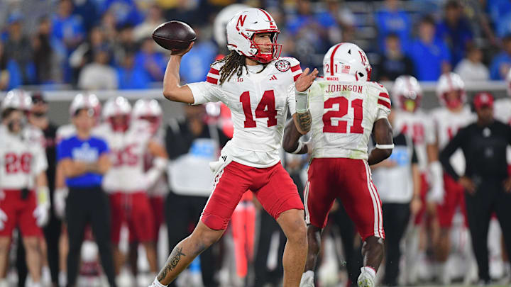 Nov 8, 2025; Pasadena, California, USA; Nebraska Cornhuskers quarterback TJ Lateef (14) throws against the UCLA Bruins during the first half at the Rose Bowl. Nov 8, 2025; Pasadena, California, USA; Nebraska Cornhuskers quarterback TJ Lateef (14) throws against the UCLA Bruins during the first half at the Rose Bowl.
