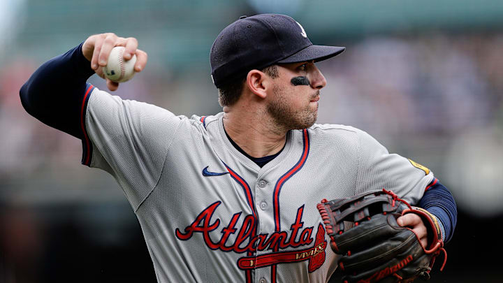 Aug 11, 2024; Denver, Colorado, USA; Atlanta Braves third baseman Austin Riley (27) throws to first for an out in the fifth inning against the Colorado Rockies at Coors Field. Mandatory Credit: Isaiah J. Downing-USA TODAY Sports