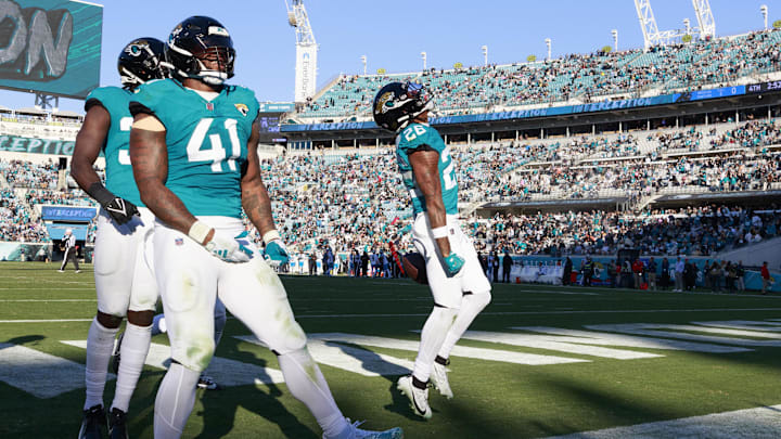 Dec 31, 2023; Jacksonville, Florida, USA;  Jacksonville Jaguars safety Antonio Johnson (26) and