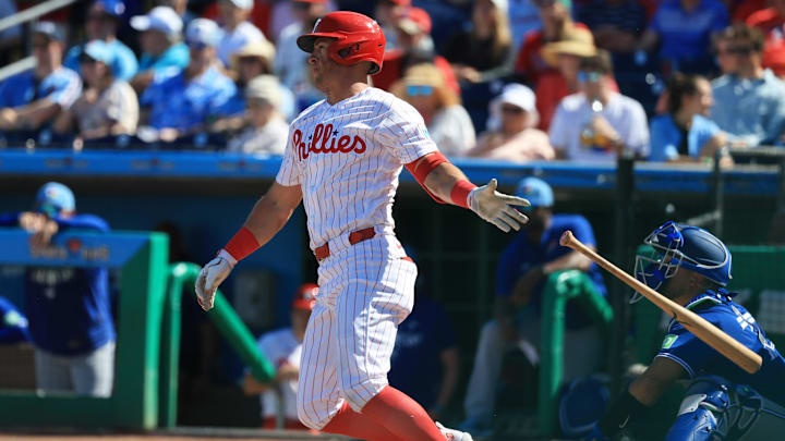 Dylan Moore (25) singles during the sixth inning against the Toronto Blue Jays at BayCare Ballpark.
