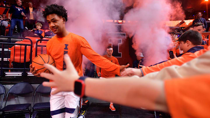 Dec 10, 2024; Champaign, Illinois, USA; Illinois Fighting Illini player AJ Redd takes the court before a game with the Wisconsin Badgers at State Farm Center. Dec 10, 2024; Champaign, Illinois, USA; Illinois Fighting Illini player AJ Redd takes the court before a game with the Wisconsin Badgers at State Farm Center.