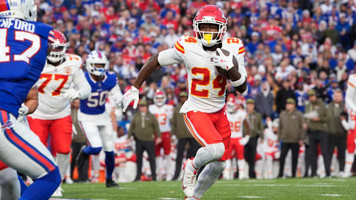 Nov 2, 2025; Orchard Park, New York, USA; Kansas City Chiefs running back Brashard Smith (24) runs the ball in the first quarter against the Buffalo Bills at Highmark Stadium. Mandatory Credit: Gregory Fisher-Imagn Images