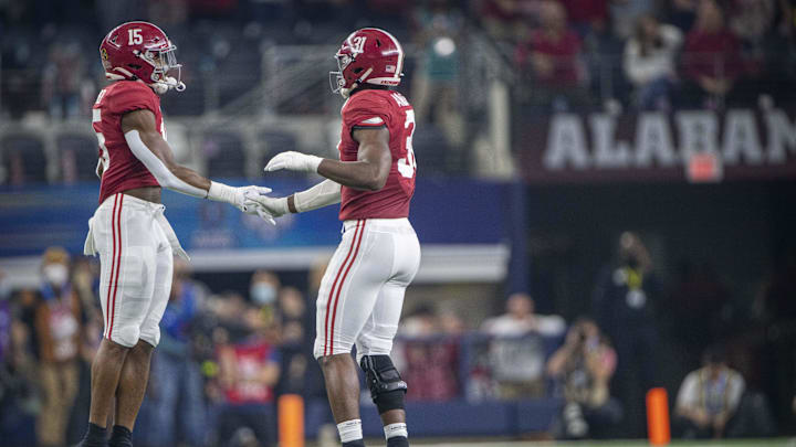 Dec 31, 2021; Arlington, Texas, USA; Alabama Crimson Tide linebacker Dallas Turner (15) and linebacker Will Anderson Jr. (31) celebrates a sack of during the second quarter during the 2021 Cotton Bowl college football CFP national semifinal game at AT&T Stadium. Mandatory Credit: Jerome Miron-Imagn Images Dec 31, 2021; Arlington, Texas, USA; Alabama Crimson Tide linebacker Dallas Turner (15) and linebacker Will Anderson Jr. (31) celebrates a sack of during the second quarter during the 2021 Cotton Bowl college football CFP national semifinal game at AT&T Stadium. Mandatory Credit: Jerome Miron-Imagn Images