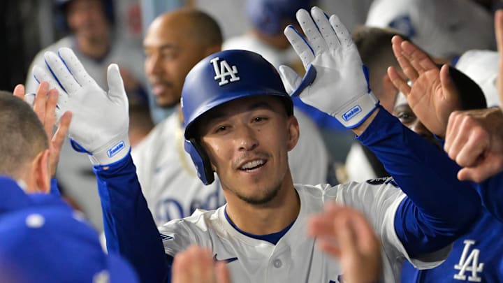 Sept. 30, 2025; Los Angeles, California, USA; Los Angeles Dodgers second baseman Tommy Edman (25) celebrates after hitting a home run during the third inning against the Cincinnati Reds during game one of the Wildcard round for the 2025 MLB playoffs at Dodger Stadium.