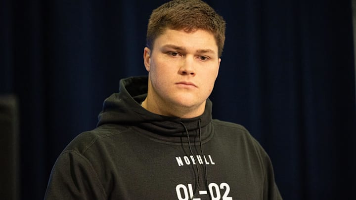 Notre Dame offensive lineman Joe Alt (OL02) talks to the media during the NFL Combine