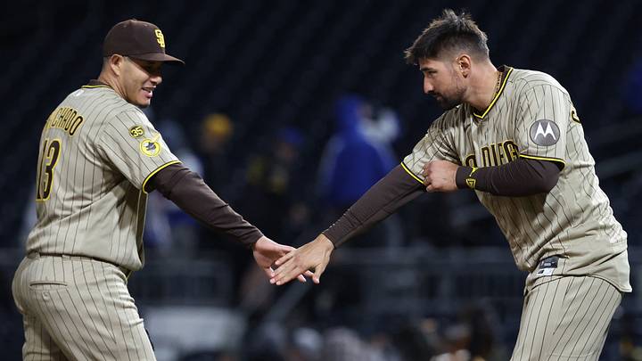 Apr 6, 2026; Pittsburgh, Pennsylvania, USA;  San Diego Padres third baseman Manny Machado (13) and designated hitter Nick Castellanos (right) celebrate after defeating the Pittsburgh Pirates at PNC Park. Mandatory Credit: Charles LeClaire-Imagn Images