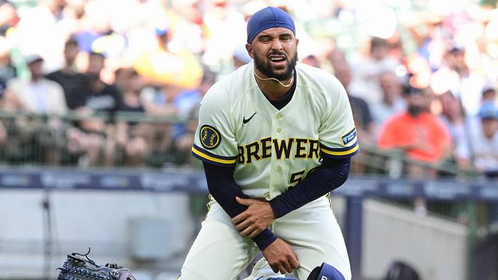 Jun 4, 2026; Milwaukee, Wisconsin, USA;  Milwaukee Brewers pitcher Grant Anderson (56) reacts after getting hit by a line drive in the seventh inning against the San Francisco Giants at American Family Field. Mandatory Credit: Benny Sieu-Imagn Images