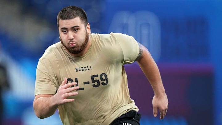 Mar 3, 2024; Indianapolis, IN, USA; Kansas offensive lineman Dominick Puni (OL59)