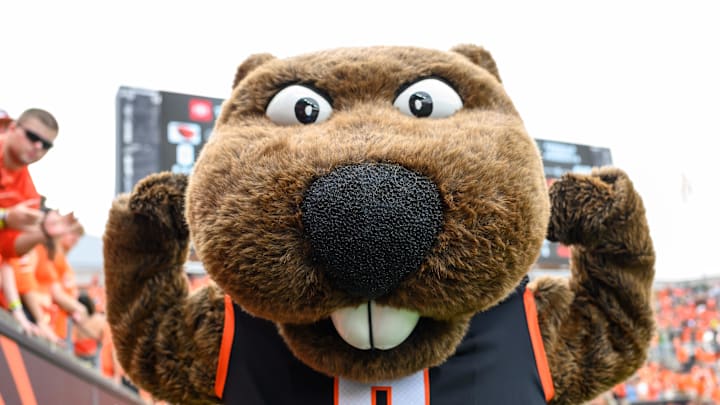 Sep 14, 2024; Corvallis, Oregon, USA; Oregon State Beavers mascot Benny flexes during the second half against the Oregon Ducks at Reser Stadium. Mandatory Credit: Craig Strobeck-Imagn Images
