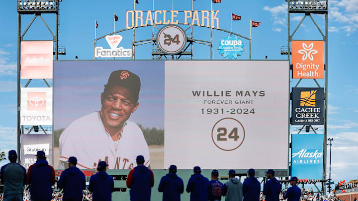 Jun 24, 2024; San Francisco, California, USA; Chicago Cubs players stand during a moment of silence in honor of Willie Mays before the game against San Francisco Giants at Oracle Park. 