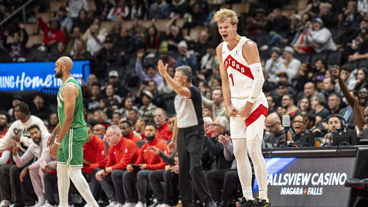 Oct 15, 2024; Toronto, Ontario, CAN;  Toronto Raptors guard Gradey Dick (1) celebrates scoring against the Boston Celtics during the first half at Scotiabank Arena. Mandatory Credit: Kevin Sousa-Imagn Images