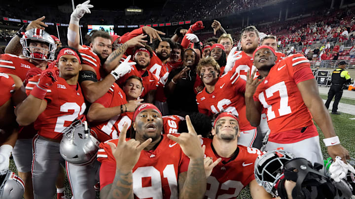 Sept. 7, 2024; Columbus, Ohio, USA;
Ohio State Buckeye football players pose with strength and conditioning assistant KJ Redmon of Western Michigan during the second half of an NCAA Division I football game on Saturday at Ohio Stadium.