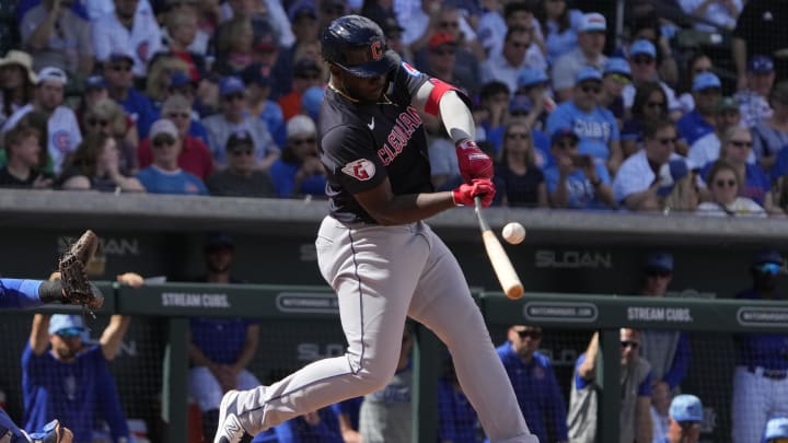 Mar 3, 2024; Mesa, Arizona, USA; Cleveland Guardians outfielder Jhonkensy Noel (78) hits a single against the Chicago Cubs in the third inning at Sloan Park. Mandatory Credit: Rick Scuteri-USA TODAY Sports