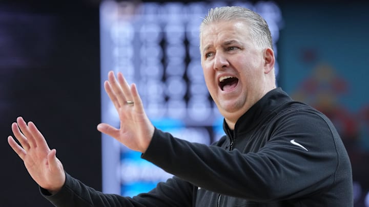Purdue Boilermakers head coach Matt Painter yells down the court during the Final Four.