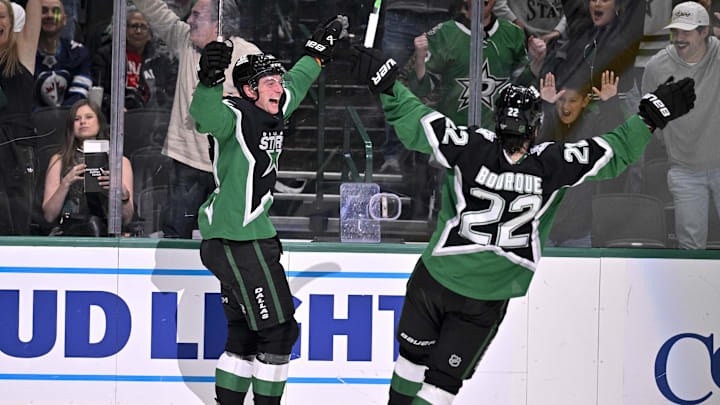 Feb 2, 2026; Dallas, Texas, USA; Dallas Stars defenseman Thomas Harley (55) and center Mavrik Bourque (22) celebrate after Harley scores the game winning goal the Winnipeg Jets during the overtime period at the American Airlines Center. Mandatory Credit: Jerome Miron-Imagn Images
