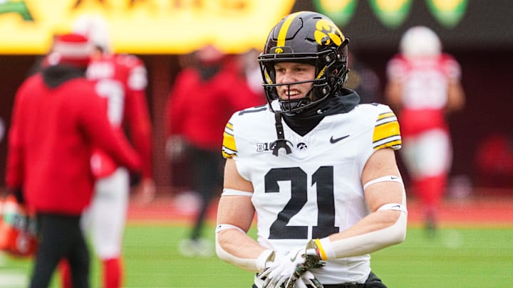 Nov 28, 2025; Lincoln, Nebraska, USA; Iowa Hawkeyes wide receiver Kaden Wetjen (21) warms up before the game against the Nebraska Cornhuskers at Memorial Stadium. Mandatory Credit: Dylan Widger-Imagn Images