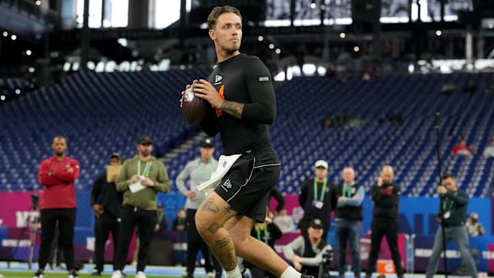 Feb 28, 2026; Indianapolis, IN, USA; Miami quarterback Carson Beck (QB04) during the NFL Scouting Combine at Lucas Oil Stadium. Mandatory Credit: Kirby Lee-Imagn Images