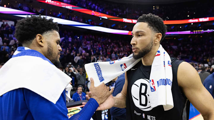 Nov 22, 2022; Philadelphia, Pennsylvania, USA; Brooklyn Nets guard Ben Simmons (R) and Philadelphia 76ers forward Tobias Harris (L) shake hands after the game at Wells Fargo Center. Mandatory Credit: Bill Streicher-Imagn Images