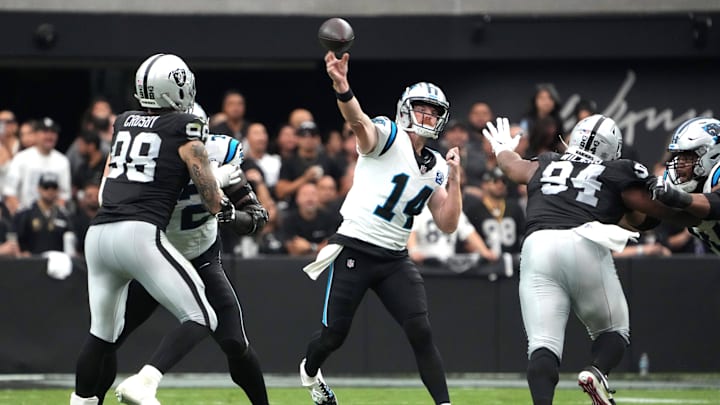 Sep 22, 2024; Paradise, Nevada, USA; Carolina Panthers quarterback Andy Dalton (14) throws the ball against the Las Vegas Raiders in the first half at Allegiant Stadium. Mandatory Credit: Kirby Lee-Imagn Images Sep 22, 2024; Paradise, Nevada, USA; Carolina Panthers quarterback Andy Dalton (14) throws the ball against the Las Vegas Raiders in the first half at Allegiant Stadium. Mandatory Credit: Kirby Lee-Imagn Images