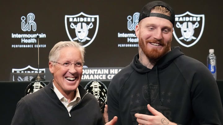 Jan 27, 2025; Las Vegas, NV, USA; Las Vegas Raiders defensive end Maxx Crosby (right) and coach Pete Carroll at press conference at Intermountain Health Performance Center. Mandatory Credit: Kirby Lee-Imagn Images