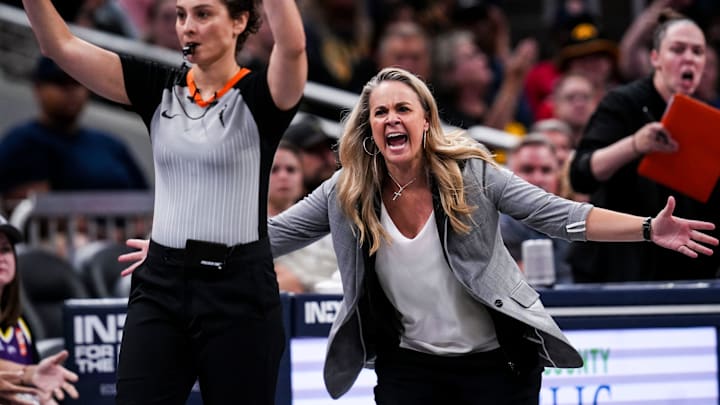 Las Vegas Aces head coach Becky Hammon yells at an official Wednesday, Sept. 11, 2024, during a game between the Indiana Fever and the Las Vegas Aces at Gainbridge Fieldhouse in Indianapolis. The Aces defeated the Fever, 86-75. Las Vegas Aces head coach Becky Hammon yells at an official Wednesday, Sept. 11, 2024, during a game between the Indiana Fever and the Las Vegas Aces at Gainbridge Fieldhouse in Indianapolis. The Aces defeated the Fever, 86-75.