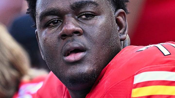 Maryland Terrapins offensive lineman Alan Herron (71) takes a breather on the sideline during a game against the Washington Huskies at SECU Stadium. Mandatory Credit: Jamie Sabau-Imagn Images