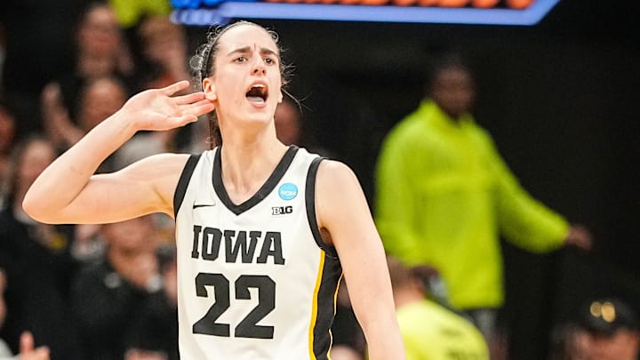Iowa Hawkeyes guard Caitlin Clark (22) celebrates in the final seconds of a second-round NCAA Tournament game between Iowa and West Virginia, Monday, March 25, 2024 at Carver Hawkeye Arena in Iowa City. Iowa Hawkeyes guard Caitlin Clark (22) celebrates in the final seconds of a second-round NCAA Tournament game between Iowa and West Virginia, Monday, March 25, 2024 at Carver Hawkeye Arena in Iowa City.