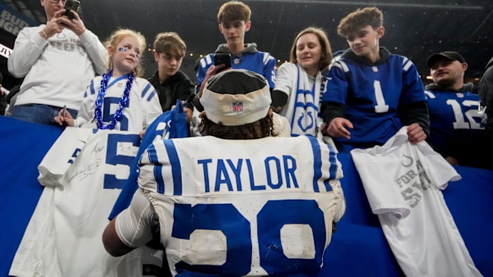 Indianapolis Colts running back Jonathan Taylor (28) signs autographs for fans Sunday, Dec. 22, 2024, after winning a game against the Tennessee Titans at Lucas Oil Stadium in Indianapolis. Indianapolis Colts running back Jonathan Taylor (28) signs autographs for fans Sunday, Dec. 22, 2024, after winning a game against the Tennessee Titans at Lucas Oil Stadium in Indianapolis.
