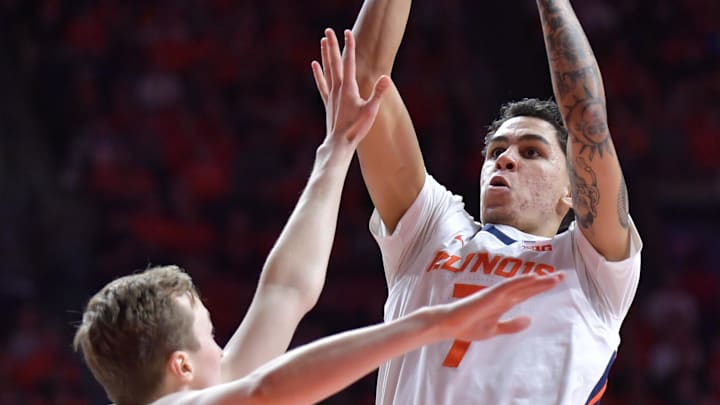 Mar 7, 2025; Champaign, Illinois, USA;  Illinois Fighting Illini forward Will Riley (7) shoots the ball over Purdue Boilermakers guard Fletcher Loyer (2) during the first half at State Farm Center. Mandatory Credit: Ron Johnson-Imagn Images