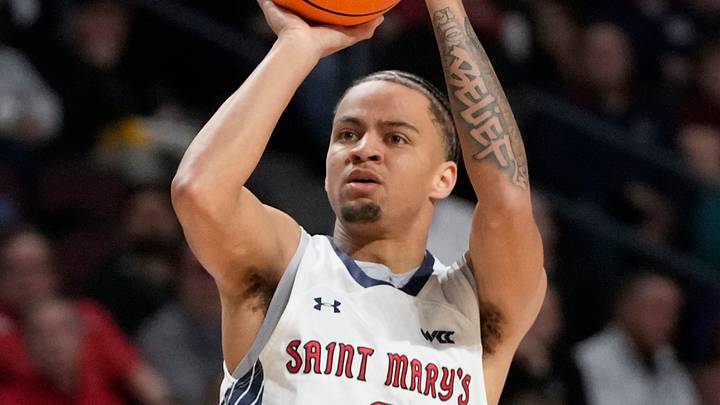 St. Mary's Gaels guard Mikey Lewis (0) shoots the basketball against the Gonzaga Bulldogs during the first half in the final of the West Coast Conference tournament at Orleans Arena. St. Mary's Gaels guard Mikey Lewis (0) shoots the basketball against the Gonzaga Bulldogs during the first half in the final of the West Coast Conference tournament at Orleans Arena.