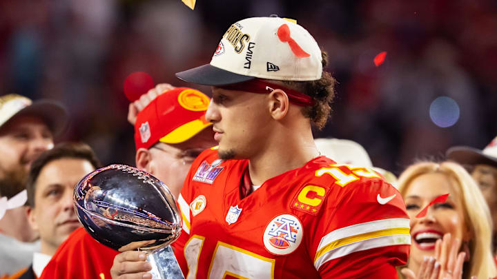 Patrick Mahomes holds the Lombardi Trophy after winning Super Bowl LVII.