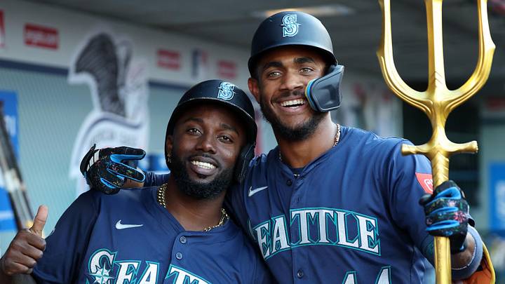 Jul 25, 2025; Anaheim, California, USA; Seattle Mariners center fielder Julio Rodriguez (44) poses with left fielder Randy Arozarena (56) after hitting a home run during the first inning against the Los Angeles Angels at Angel Stadium. Mandatory Credit: Kiyoshi Mio-Imagn Images Jul 25, 2025; Anaheim, California, USA; Seattle Mariners center fielder Julio Rodriguez (44) poses with left fielder Randy Arozarena (56) after hitting a home run during the first inning against the Los Angeles Angels at Angel Stadium. Mandatory Credit: Kiyoshi Mio-Imagn Images