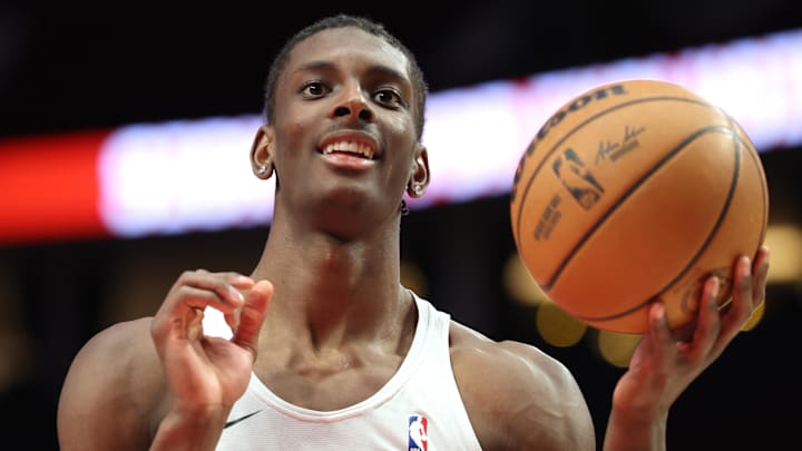Mar 10, 2026; Portland, Oregon, USA;  Charlotte Hornets forward Moussa Diabate (14) warms up before the game against the Portland Trail Blazers at Moda Center. Mandatory Credit: Jaime Valdez-Imagn Images
