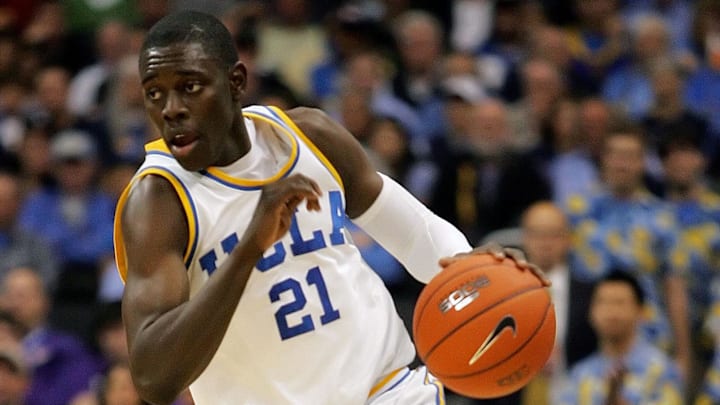 March 12, 2009; Los Angeles, CA, USA; UCLA Bruins guard Jrue Holiday (21) moves the ball up court against the Washington State Cougars during the first half of the quarterfinals of the Pac-10 tournament at Staples Center. Mandatory Credit: Gary A. Vasquez-Imagn Images