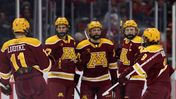 The Gophers celebrate after a goal in a 6-3 win at Ohio State. 