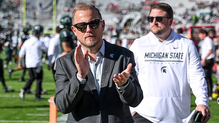 Michigan State’s Athletic Director Dan Bartholomae claps before the football game against Nebraska on Saturday, Sept. 26, 2026, in East Lansing.