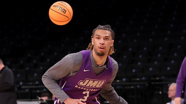 Mar 21, 2024; Brooklyn, NY, USA; James Madison Dukes forward T.J. Bickerstaff (3) handles the ball
