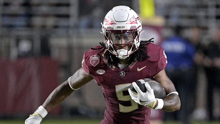 Sep 21, 2024; Tallahassee, Florida, USA; Florida State Seminoles running back Lawrance Toafili (9) runs the ball during the first half against the California Golden Bears at Doak S. Campbell Stadium. Mandatory Credit: Melina Myers-Imagn Images Sep 21, 2024; Tallahassee, Florida, USA; Florida State Seminoles running back Lawrance Toafili (9) runs the ball during the first half against the California Golden Bears at Doak S. Campbell Stadium. Mandatory Credit: Melina Myers-Imagn Images