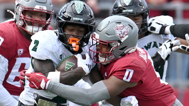  WSU linebacker Taariq Al-Uqdah, shown here against Hawaii, will transfer to Washington.   