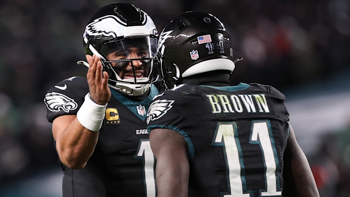 Nov 28, 2025; Philadelphia, Pennsylvania, USA; Philadelphia Eagles quarterback Jalen Hurts (1) and wide receiver A.J. Brown (11) celebrate a touchdown against the Chicago Bears during the third quarter of the game at Lincoln Financial Field. Mandatory Credit: Bill Streicher-Imagn Images