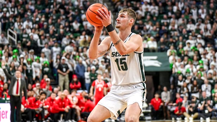 Michigan State's Carson Cooper scores against Ohio State during the second half on Sunday, Feb. 22, 2026, at the Breslin Center in East Lansing. Michigan State's Carson Cooper scores against Ohio State during the second half on Sunday, Feb. 22, 2026, at the Breslin Center in East Lansing.