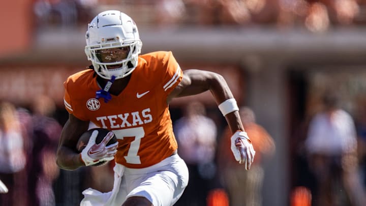 Texas Longhorns wide receiver Isaiah Bond (7) runs the ball forward as the Texas Longhorns take on Mississippi State at Darrell K Royal-Texas Memorial Stadium in Austin Saturday, Sept. 28, 2024.