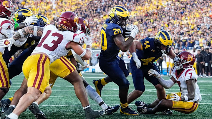Michigan running back Kalel Mullings (20) runs for a touchdown against USC during the second half at Michigan Stadium in Ann Arbor on Saturday, Sept. 21, 2024. Michigan running back Kalel Mullings (20) runs for a touchdown against USC during the second half at Michigan Stadium in Ann Arbor on Saturday, Sept. 21, 2024.