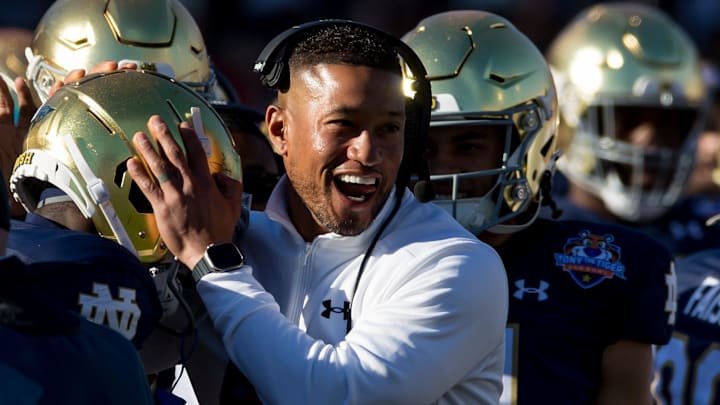 Notre Dame head football coach Marcus Freeman celebrates at the 90th annual Sun Bowl game against